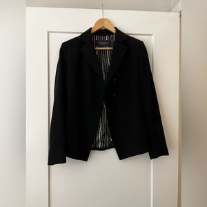 Paul Costello Dressage black wool jacket with black and white lining in US 4